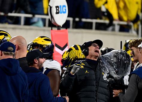 michi scandal|University of Michigan football sign.